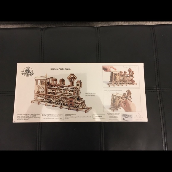 NEW New Disney Parks UGears Mechanical Model.
316 pieces. - Picture 5 of 7